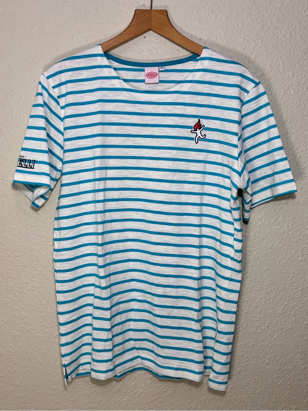 Firelli Hot Sauce t-shirt blue and white horizontal stripes. Women’s Large